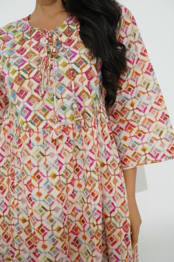 DSC090611 A graceful cotton dress with delicate beadwork